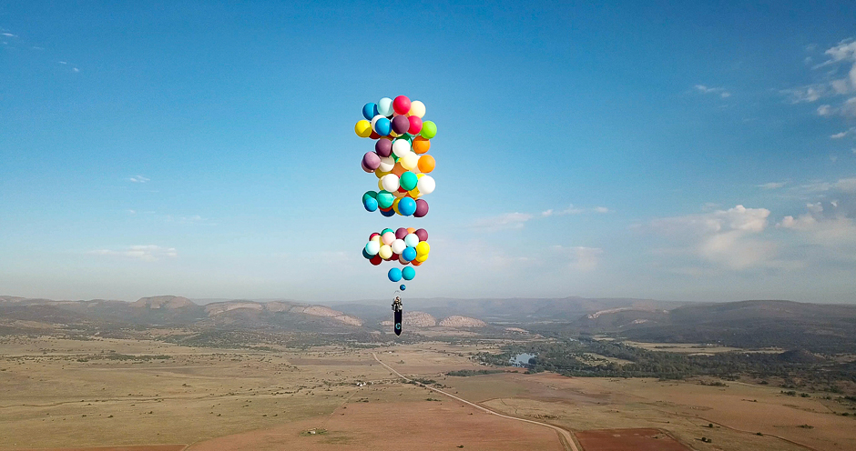 tom morgan from bristol based company the adventurists flies in a chair with large party balloons tied to it near johannesburg south africa photo reuters