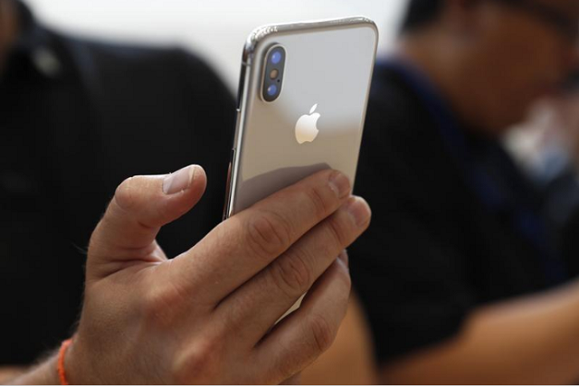 file photo an attendee checks out a new iphone x during an apple launch event in cupertino california us september 12 2017 photo reuters