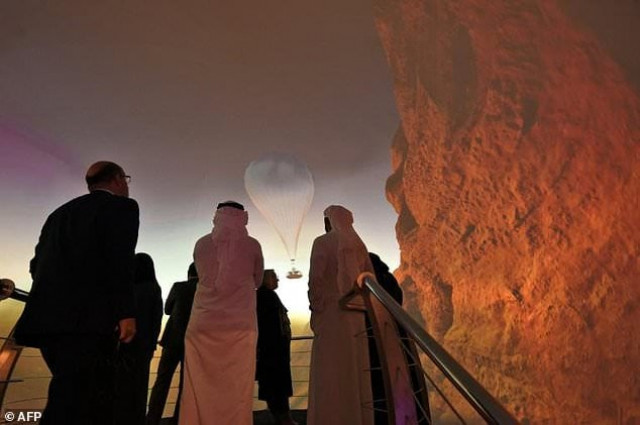 participants watch images promoting saudi arabia 039 s red sea project at the future investment initiatives conference in riyadh photo afp participants watch images promoting saudi arabia 039 s red sea project at the future investment initiatives conference in riyadh photo afp