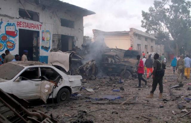 a general view shows the aftermath of a bomb explosion at the gate of naso hablod two hotel in hamarweyne district of mogadishu somalia october 28 2017 photo reuters