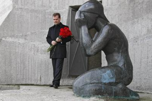 dmitry medvedev lays flowers at the monument quot mask of sorrow quot a memorial site for the people who died in soviet prison camps outside the far eastern city of magadan photo reuters