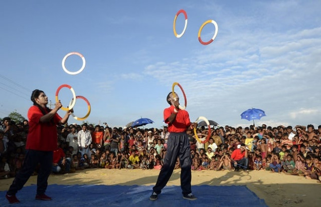 rohingya refugee children watching the bangladeshi theatre group quot drama therapy quot at kutupalong refugee camp in ukhia photo afp rohingya refugee children watching the bangladeshi theatre group quot drama therapy quot at kutupalong refugee camp in ukhia photo afp