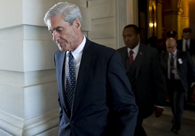 special counsel robert mueller seen here in a file photo from june reportedly has secured a first indictment in his inquiry into russian interference in november 039 s us presidential election photo afp