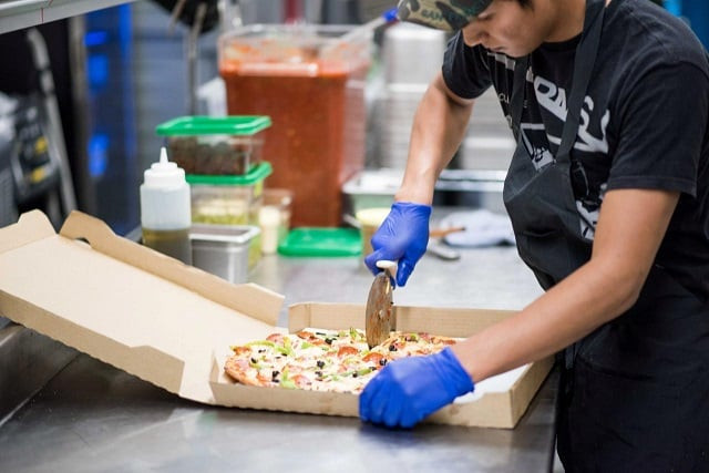 a kitchen staffer at the star pizzeria prepares a pizza for delivery by doordash in san jose california u s in this undated handout photo obtained by reuters october 30 2017 photo reuters a kitchen staffer at the star pizzeria prepares a pizza for delivery by doordash in san jose california u s in this undated handout photo obtained by reuters october 30 2017 photo reuters