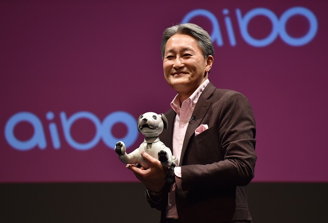 sony 039 s president and chief executive officer shows entertainment robot quot aibo quot at a conference in tokyo photo afp