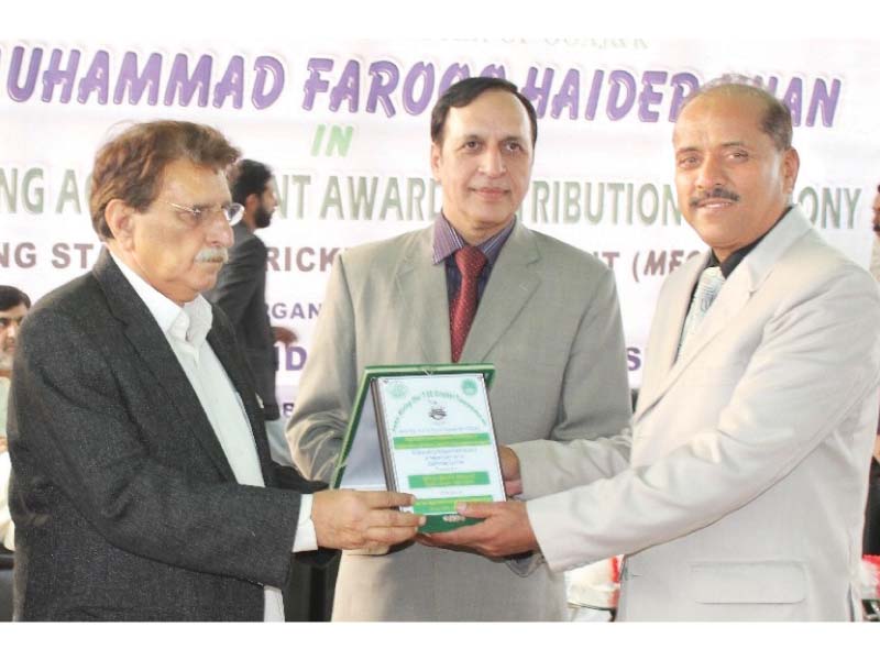 ajk pm farooq haider confers a shield during the prize distribution ceremony photo express