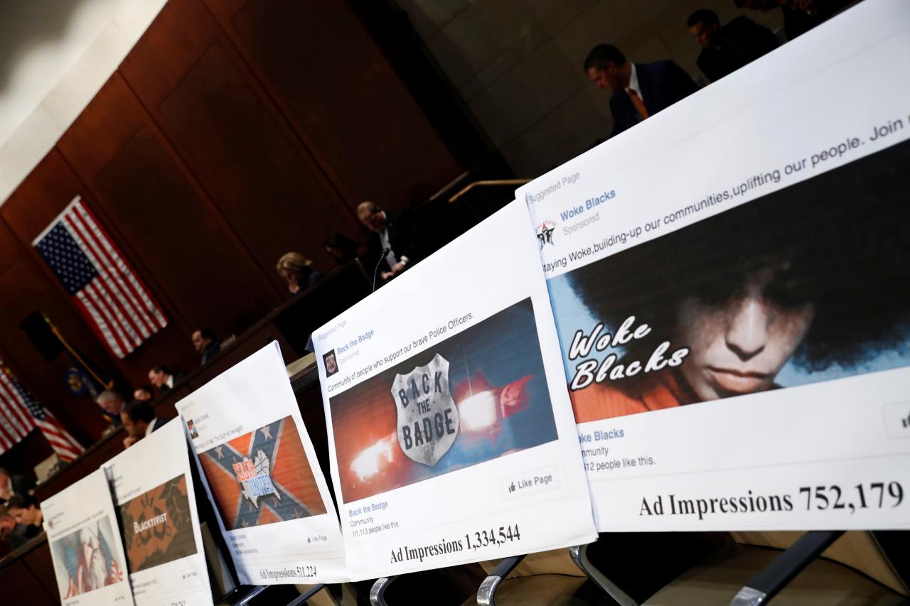 examples of facebook pages are seen as executives appear before the house intelligence committee to answer questions related to russian use of social media to influence u s elections on capitol hill in washington u s november 1 2017 photo reuters