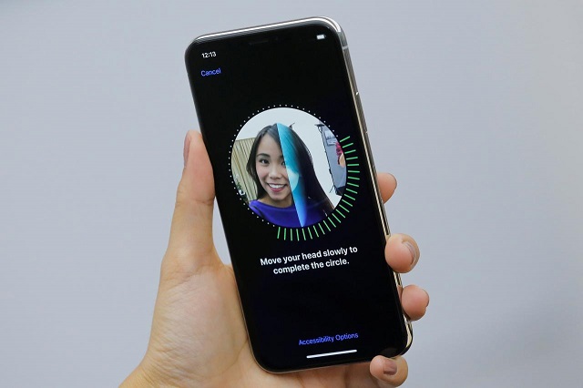an attendee uses the face id function on the new iphone x during a presentation for the media in beijing china october 31 2017 photo reuters