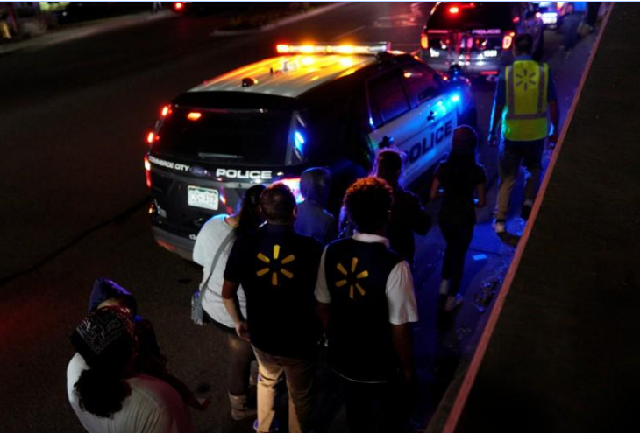 walmart employees and shoppers leave the scene of a shooting at a walmart in thornton colorado november 1 2017 photo reuters