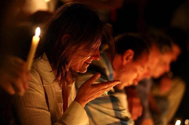 a woman reacts as people place candles outside the instituto politecnico a technical high school where the five argentine citizens who were killed in the truck attack in new york on october 31 went to school in rosario argentina november 1 2017 photo reuters a woman reacts as people place candles outside the instituto politecnico a technical high school where the five argentine citizens who were killed in the truck attack in new york on october 31 went to school in rosario argentina november 1 2017 photo reuters