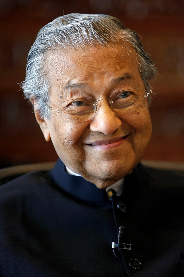 file photo former malaysian prime minister mahathir mohamad smiles during an interview with reuters in putrajaya malaysia march 30 2017 photo reuters