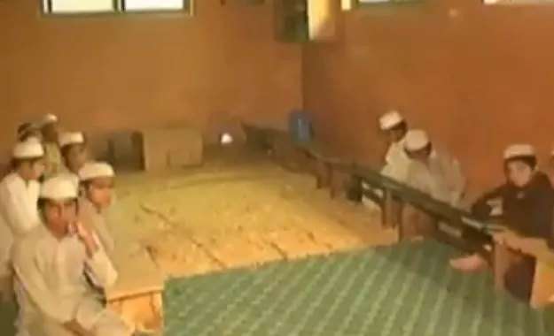 students at the madrassa in madina town faisalabad where a child was molested and murdered photo express screengrab students at the madrassa in madina town faisalabad where a child was molested and murdered photo express screengrab