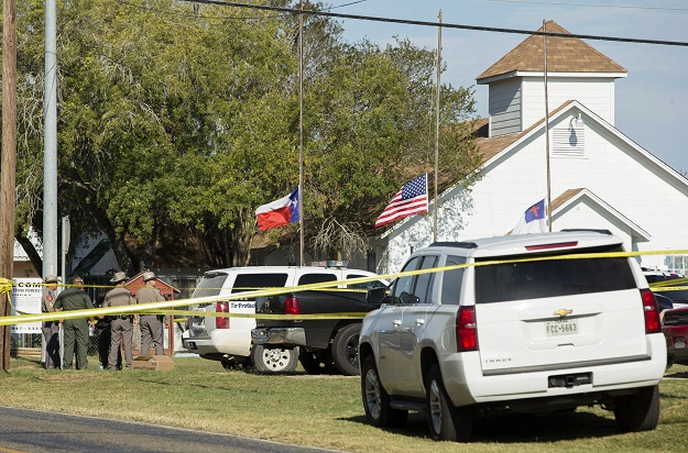 law enforcement officials gather near the first baptist church following a shooting on november 5 2017 in sutherland springs texas photo afp