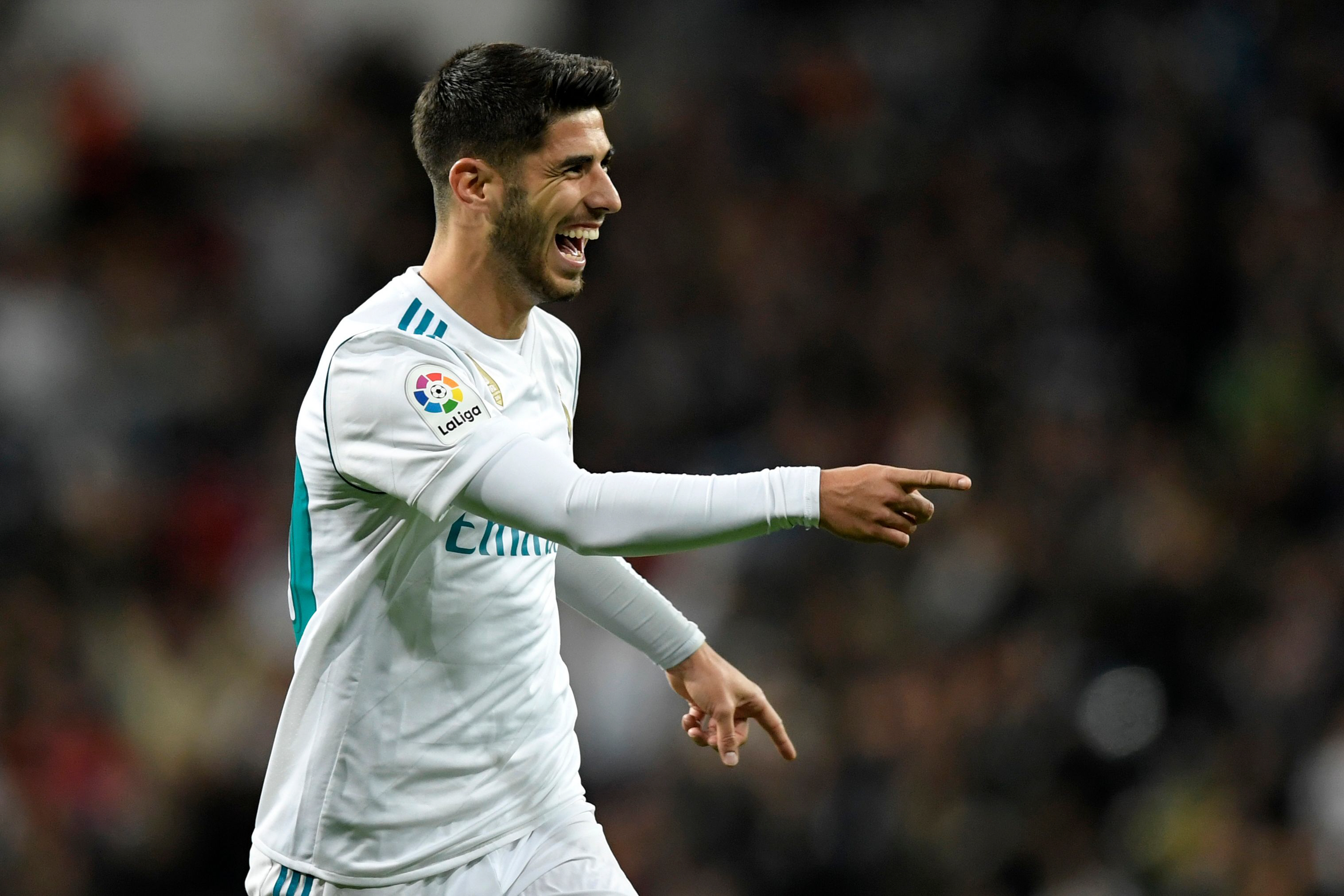 asensio celebrates after scoring a stunner against las palmas as real win 3 0 photo afp