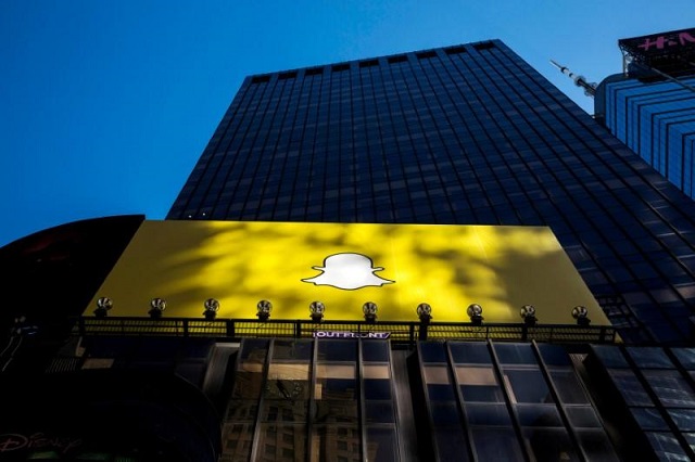 file photo    a billboard displays the logo of snapchat above times square in new york march 12 2015 photo reuters