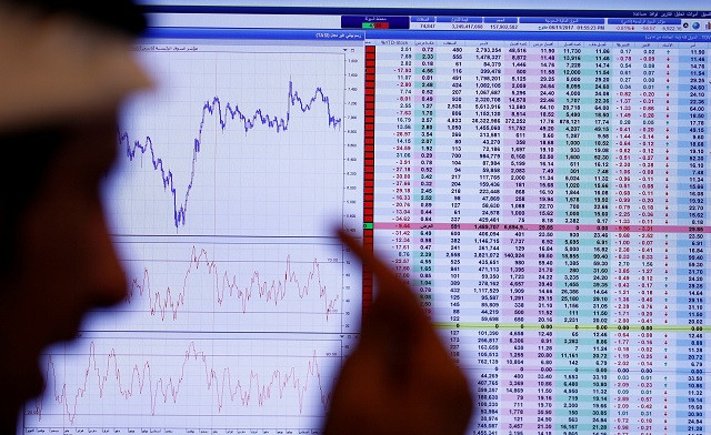 an investor gestures as he monitors a screen displaying stock information in riyadh saudi arabia november 6 2017 photo reuters an investor gestures as he monitors a screen displaying stock information in riyadh saudi arabia november 6 2017 photo reuters