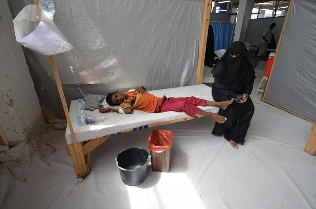a woman sits next to her son who is infected with cholera at a hospital in the red sea port city of hodeidah photo reuters a woman sits next to her son who is infected with cholera at a hospital in the red sea port city of hodeidah photo reuters