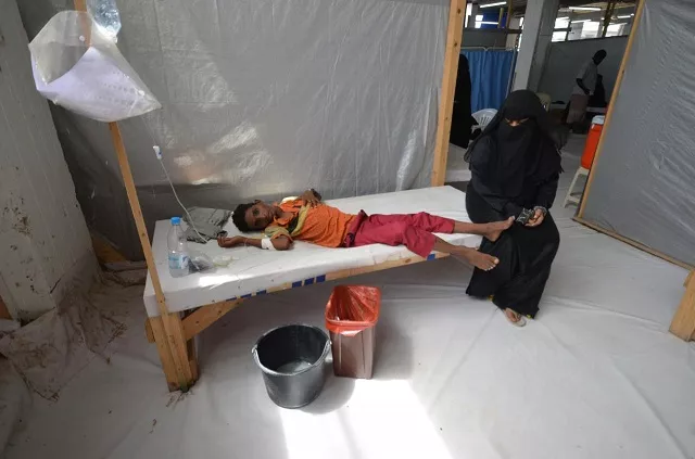a woman sits next to her son who is infected with cholera at a hospital in the red sea port city of hodeidah photo reuters a woman sits next to her son who is infected with cholera at a hospital in the red sea port city of hodeidah photo reuters