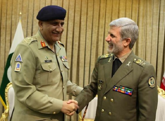 army chief general qamar javed bajwa shaking hands with iranian defence minister brigadier general amir hatami in tehran on tuesday photo ispr