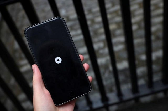 the uber logo is seen on mobile telephone in london britain september 25 2017 photo reuters the uber logo is seen on mobile telephone in london britain september 25 2017 photo reuters