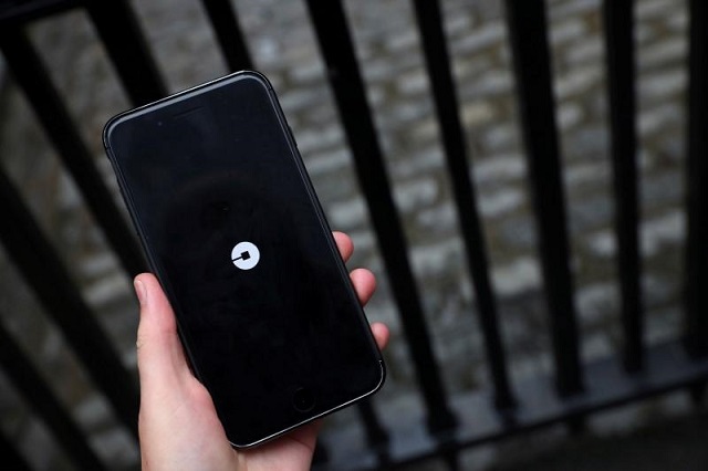 the uber logo is seen on mobile telephone in london britain september 25 2017 photo reuters