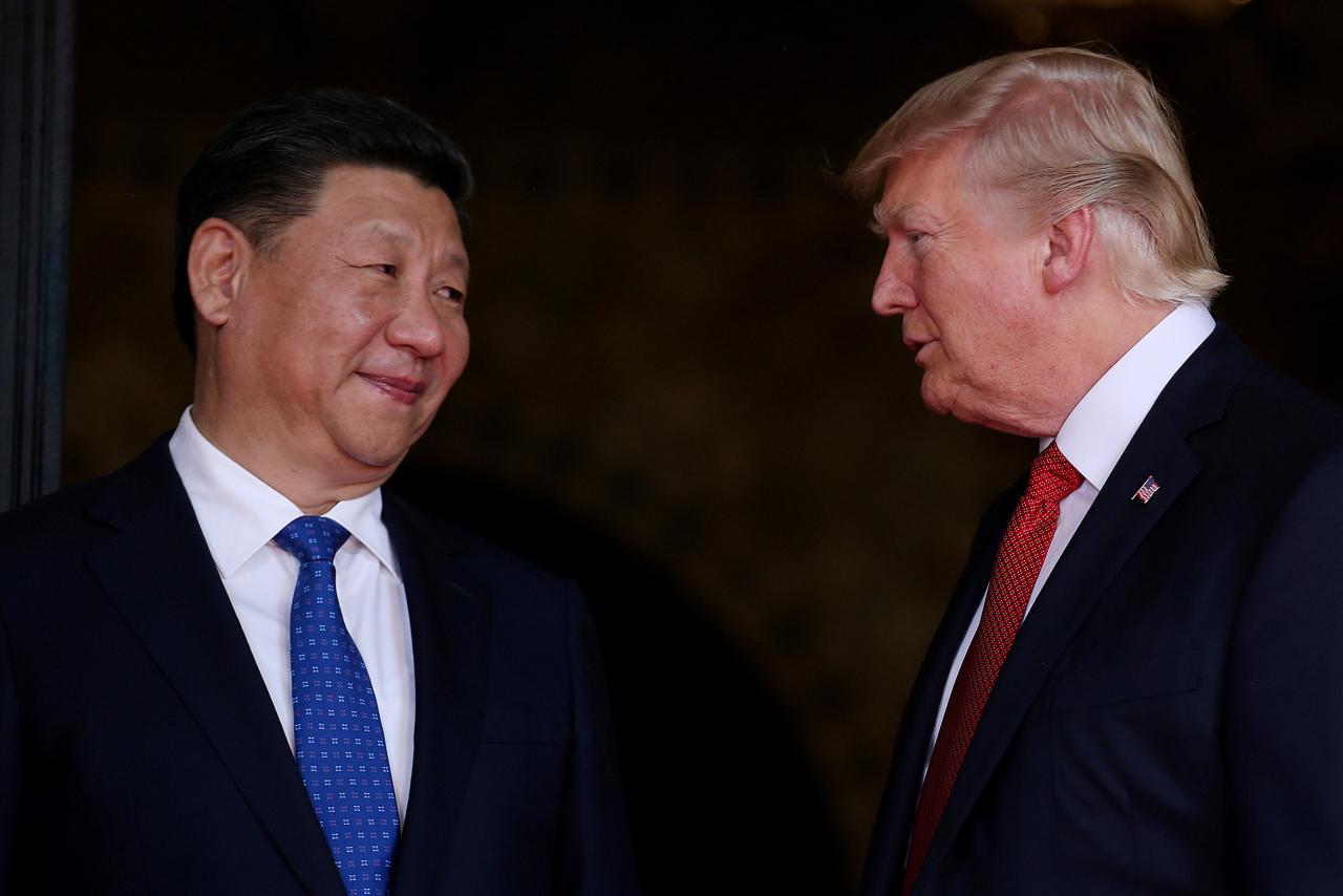 us president donald trump welcomes chinese president xi jinping at mar a lago state in palm beach florida us photo reuters