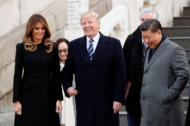 us president donald trump and us first lady melania visit the forbidden city with china s president xi jinping in beijing china november 8 2017 photo reuters