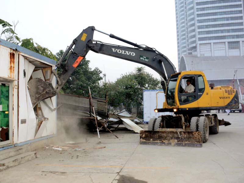 cda workers remove an encroachment at centaurus mall photo mudassar raja express