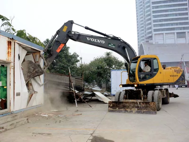 cda workers remove an encroachment at centaurus mall photo mudassar raja express cda workers remove an encroachment at centaurus mall photo mudassar raja express