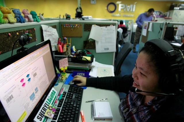 file photo a call center agent talks to a client in the us as she works the overnight shift in manila 039 s makati financial district february 6 2012 photo reuters file photo a call center agent talks to a client in the us as she works the overnight shift in manila 039 s makati financial district february 6 2012 photo reuters