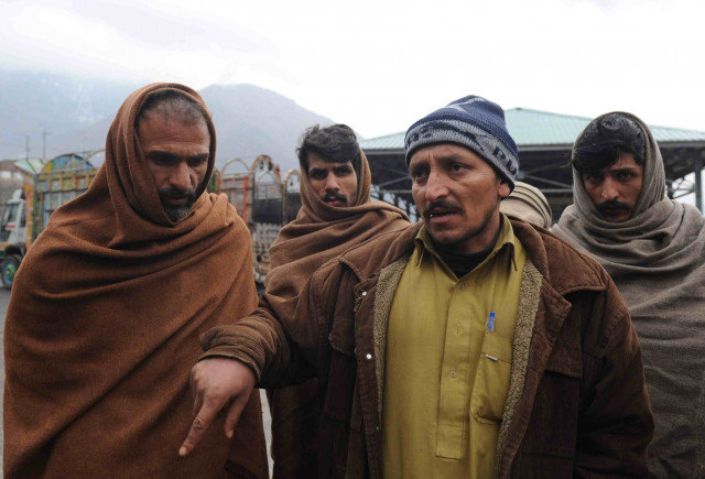 file photo stranded indian kashmiri truck drivers sit at the trade facilitation centre in chakoti just inside pakistan administered kashmir on january 24 2014 photo afp file photo stranded indian kashmiri truck drivers sit at the trade facilitation centre in chakoti just inside pakistan administered kashmir on january 24 2014 photo afp