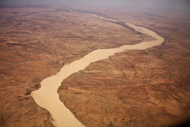 a dried up river filled with sand winds its way across the desert near gos beida in eastern chad june 5 2008 photo reuters a dried up river filled with sand winds its way across the desert near gos beida in eastern chad june 5 2008 photo reuters
