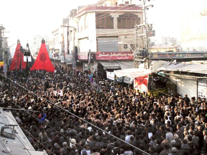 the main procession passes through iqbal road in rawalpindi on thursday photo waseem imran express