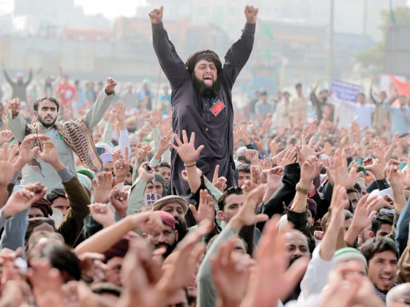 members of the tehreek e labaik pakistan shout slogans in islamabad photo reuters