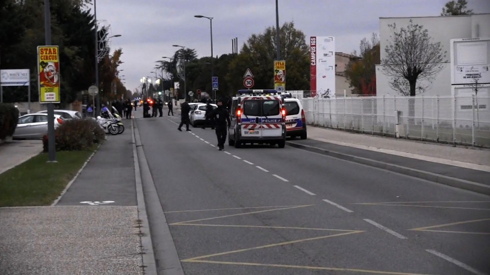 police vehicles in a street where a man deliberately rammed his car into three chinese students in blagnac near the southern french city of toulouse photo afp