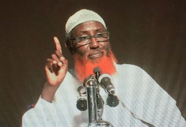 this picture shows a computer screen displaying the portrait of somali born cleric abdulqadir mumin accused of heading the islamic state group in east africa photo afp this picture shows a computer screen displaying the portrait of somali born cleric abdulqadir mumin accused of heading the islamic state group in east africa photo afp