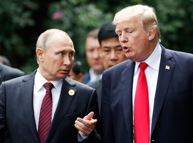 us president donald trump r and russia 039 s president vladimir putin walk together to take part in the quot family photo quot during the asia pacific economic cooperation apec leaders 039 summit in the central vietnamese city of danang on november 11 2017 photo afp us president donald trump r and russia 039 s president vladimir putin walk together to take part in the quot family photo quot during the asia pacific economic cooperation apec leaders 039 summit in the central vietnamese city of danang on november 11 2017 photo afp