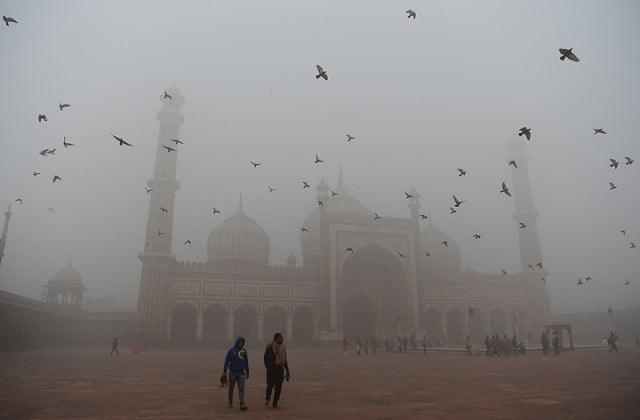 indian visitors walk through the courtyard of jama masjid amid heavy smog in the old quarters of new delhi photo afp indian visitors walk through the courtyard of jama masjid amid heavy smog in the old quarters of new delhi photo afp
