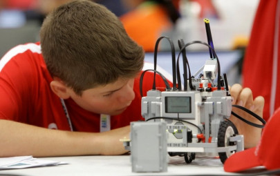 bots battle for the ball and the globe in robot olympiad