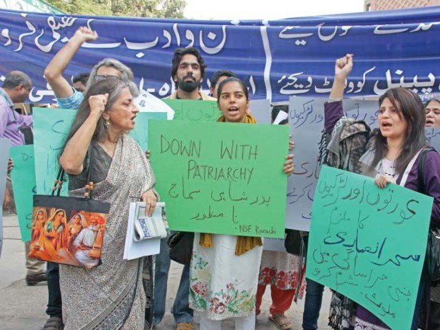 feminist activists in karachi protesting against sahar ansari accused of sexual harassment photo express