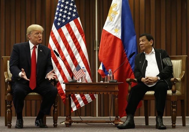 philippine president rodrigo duterte 2 l and us president donald trump l hold a bilateral meeting on the sidelines of the 31st association of southeast asian nations asean summit at the philippine international convention center in manila on november 13 2017 photo afp