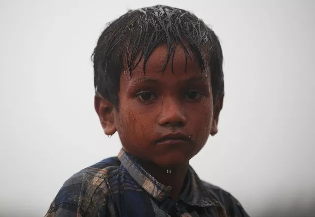 nur kabir 5 a rohingya refugee boy stands in the rain as he waits to receive permission from the bangladeshi army to continue his way after crossing the bangladesh myanmar border at a port in teknaf bangladesh october 31 2017 photo reuters nur kabir 5 a rohingya refugee boy stands in the rain as he waits to receive permission from the bangladeshi army to continue his way after crossing the bangladesh myanmar border at a port in teknaf bangladesh october 31 2017 photo reuters