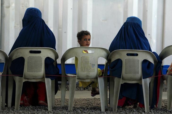 afghan refugees are seen at unhcr s voluntary repatriation centre in peshawar pakistan photo reuters