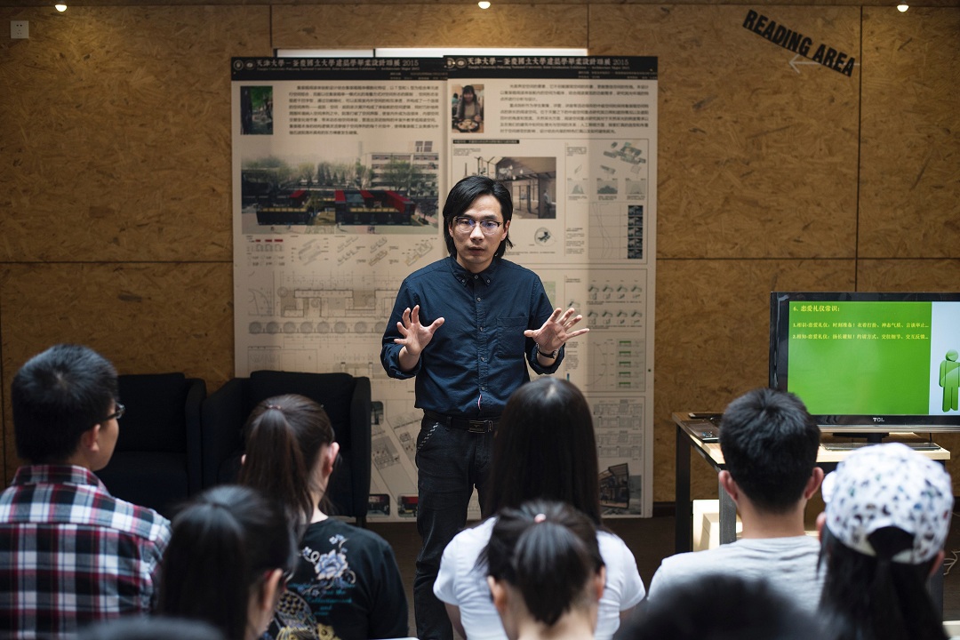 xie shu c a teacher at tianjin university giving a pick up lesson to students in the northeastern chinese city of tianjin photo afp