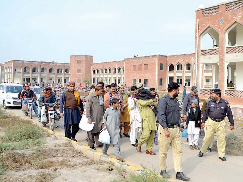 policemen escort accused to the courts at new judicial complex photo app