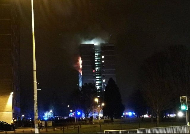 flames are seen coming fromn the side of the 15 storey coolmoyne house housing block in belfast northern ireland november 15 2017 in this image taken from social media photo via reuters flames are seen coming fromn the side of the 15 storey coolmoyne house housing block in belfast northern ireland november 15 2017 in this image taken from social media photo via reuters