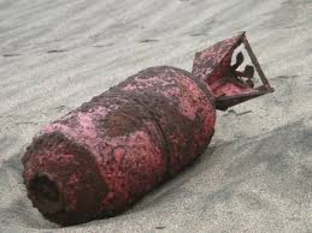 child stumbled upon an old mortar while playing in an abandoned field photo express file child stumbled upon an old mortar while playing in an abandoned field photo express file