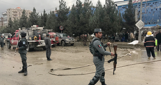 afghan secuirty forces are seen at the site of an explosion near a gathering of supporters of regional leader atta mohammad noor in kabul photo reuters