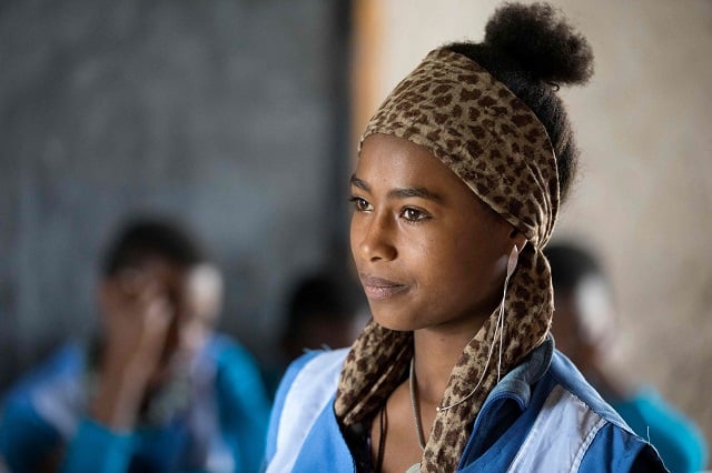 this file photo taken on october 18 2017 shows zenashe fantahun telling her experience about menstruation in front of a class at the primary school in sheno ethiopia photo afp