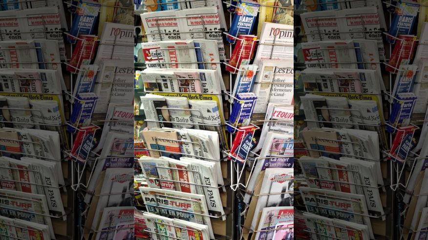 newspapers and magazines are seen in a kiosk in paris france photo reuters